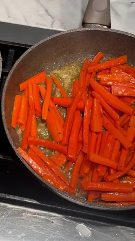If your kids hate veggies, try this trick…   Butter. Sugar. A pinch of salt. That’s all it takes to turn plain carrots into something that disappears fast off the dinner table. These butter glazed carrots are my go-to when I need a veggie side that looks a little fancy but takes no brain power. They’re sweet, salty, and glossy—like something you’d get with a roast chicken at a steakhouse. 🥕 Butter Glazed Carrots Ingredients: • 1 lb carrots (peeled + sliced) • ¾ cup water • 4 tbsp butter • 2 tbsp sugar • ½ tsp salt • Fresh black pepper to taste How to Make: 1️⃣ Add everything to a saucepan. 2️⃣ Bring to a gentle boil, then simmer covered for 10–12 mins. 3️⃣ Uncover and cook 5 more mins ‘til it’s glossy and glazed. 4️⃣ Finish with fresh cracked pepper and serve warm! 🎥 Perfect for your next “I need a vegetable but I’m tired” kind of night. #mam#mamam#mamamilliecooks#easyveggies#buttercarrots#dinnerhack#sidedishrecipe#EasyRecipesMeals#WhatsForDinner#HomemadeGoodness#SimpleEats#WeeknightDinners#FamilyMeals#CollegeEats#DormRoomRecipes#StudentMeals#BudgetCooking#QuickCollegeMeals#EasyStudentMeals#FoodTok#BusyMomLife#MomOnTheGo#FamilyFood#EasyFamilyMeals#MomLifeMeals#FeedingTheFamily#TimeSavingMeals#MamaMillieCooksookedlove