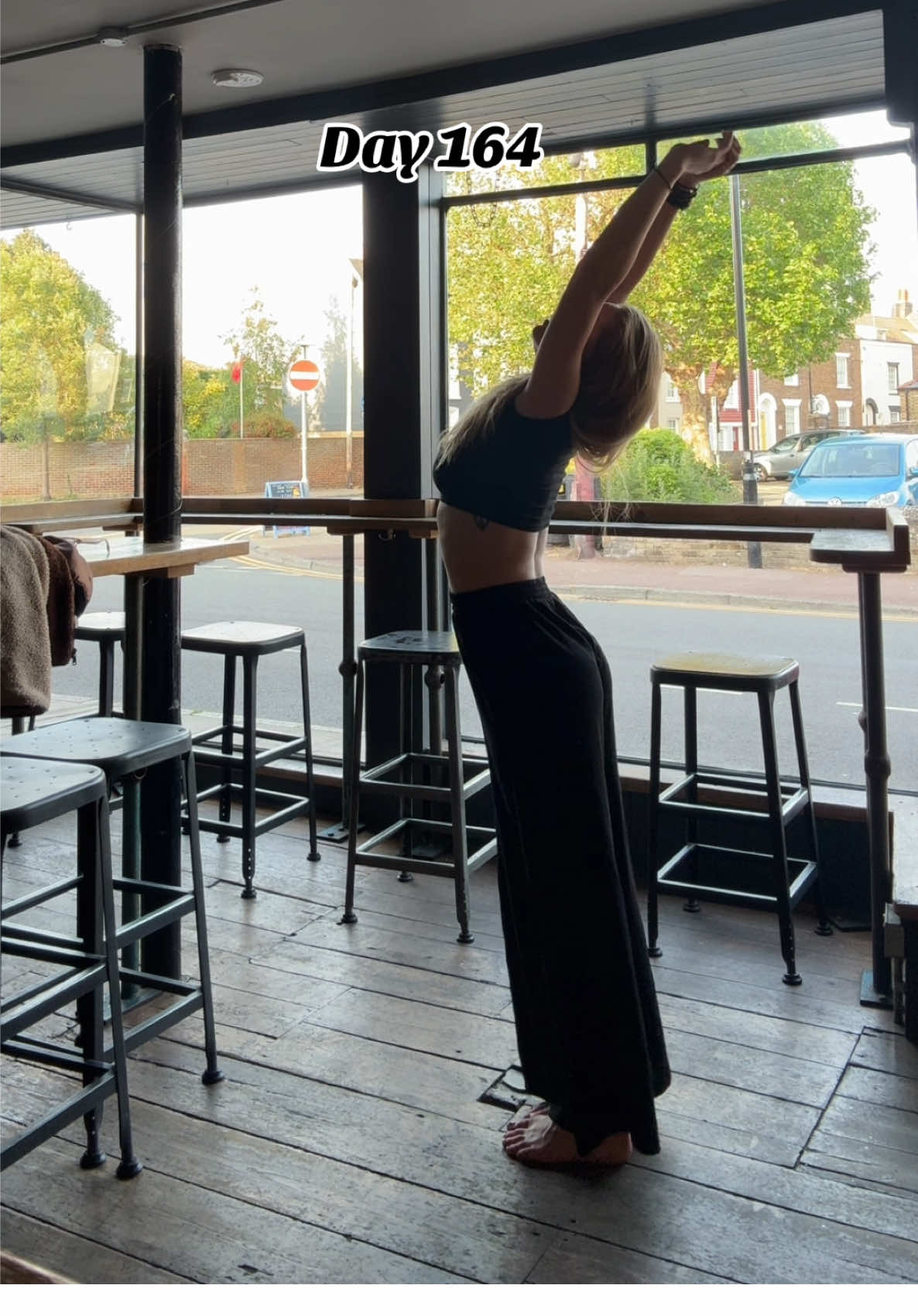 Day 164: 🧘‍♀️  13th June Finding my zen in an empty bar before hours, waiting for a taxi to pick up my van (RIP to my bank account after that wet belt change 💸). Even with unexpected detours and big expenses, it's about making time for what you've committed to. This yoga challenge isn't just about the poses; it's about showing up for myself, every single day. Where do you find time for your commitments? #YogaChallenge #DailyYoga #Commitment #FindTheTime #Mindfulness #VanLife 