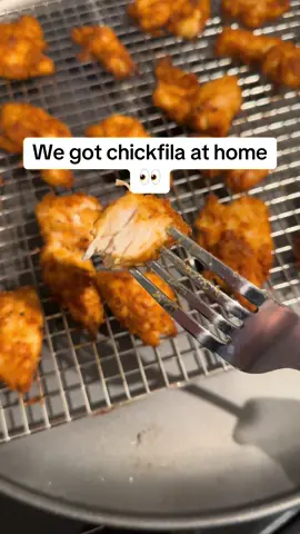 I mean close enough and doesn’t make me nauseous like chickfila does lol marinade with ranch, olive oil, light mayo and little bit of butter. season with smoked paprika, oregano, salt, black pepper, garlic salt, and onion powder- add corn starch and baking powder. Bake on a sheet like this on 425 for about 28 min. #cooking #chicken #chickfila #chickenrecipe 