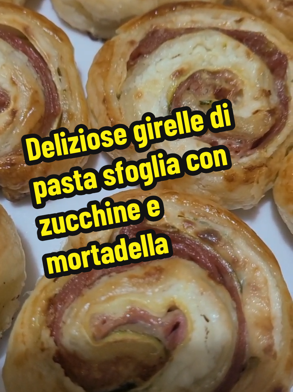 Deliziose girelle di pasta sfoglia con zucchine mortadella e formaggio; una vera golosità da dividere con gli amici 😉 Ingredienti 🛒  1 rotolo di pasta sfoglia rettangolare  3-4 cucchiai formaggio spalmabile  1 zucchina media  100g mortadella  Olio extravergine  1 tuorlo  #piattoriccomicificco  #lacucinadigilda  #gildarella  #RicettaDelGiorno  #ricettafacile  #cucinafacile  #cucinaitaliana  #cucinare  #ricettefacili  #cucinatradizionale  #andiamoneiperte  