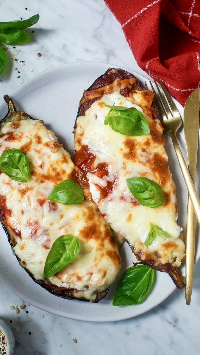 HIGHER PROTEIN EGGPLANT PARMI One of my all-time most popular recipes is back, but upgraded! This eggplant parmi is now higher in protein, still super comforting, delish and so easy to make. Save the recipe below tag a friend and let me know in the comments if you’re going to make it🙌 Ingredients: 2 medium eggplants Olive oil 1 tsp Tuscan seasoning (or mix of rosemary, garlic, onion, parsley and salt) 1 cup tomato passata or pasta sauce 1 cup cottage cheese 1 cup shredded mozzarella Parmesan cheese Method: Preheat your oven to 200°C (fan-forced). Slice the eggplants in half lengthways. Score the flesh in a criss-cross pattern (careful not to cut through the skin). Drizzle the cut sides with olive oil and sprinkle generously with Tuscan seasoning (or your own mix of rosemary, garlic, onion, parsley, and salt). Place the eggplant halves cut-side up on a lined baking tray and roast for 40 minutes or until soft and golden. Once roasted, top each eggplant half with a spoonful of tomato sauce, followed by cottage cheese and then a layer of shredded mozzarella. Top with freshly grated vegetarian Parmesan cheese. Return to the oven for another 10 minutes or until the cheese is melted and bubbly and the edges are golden. Serve hot, perfect for lunch or dinner and makes amazing leftovers too. Enjoy and follow for more healthy recipes. #highprotein #eggplant #parmigiana #lowcarb #vegetarian #healthyrecipes #healthyfood #healthyliving #healthyeating #cottagecheese #vegetarianrecipes #viralfood #comfortfood #dinnerrecipes 