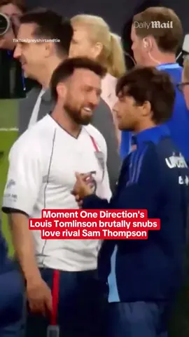 One Direction star Louis Tomlinson has been caught on camera brutally snubbing love rival Sam Thompson at Soccer Aid. This comes after Louis started dating Sam's ex-girlfriend Zara McDermott after a messy break up. Insiders were anticipating an awkward encounter between the pair - in this video obtained by DailyMail.co.uk, the One Direction star is seen embracing other players before ignoring the former Made In Chelsea star. Ouch! Read the full story on DailyMail.co.uk