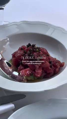 London’s newest restaurant opening, 74 Duke, has opened it’s doors in the heart of Mayfair, London 📍 Here’s what we ordered: • Bluefin Tuna • Veal cutlets • Spicy harissa spaghetti • Gratin de Raviole • Haricots Vert • Brown butter chocolate chip cookies + banana caramel ice cream Add it to your list and message us for exclusive reservations + London itineraries 🗝️ #londonsummer #londonrestaurants #74duke #mayfair #mayfairrestaurant #londonlife 