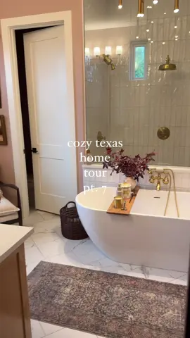 Home Tour Part 7 🛁 Our primary bathroom is one of the calmest spots in the house. Clean lines, neutral tones, and little details that make everyday routines feel a little more special. What do you think? #bathroomgoals #neutralhomevibes #hometourseries #modernbathroom #homeinspo 