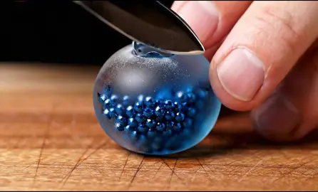 Cutting some glass fruits with jewels!🌟 #glass #fruit #glassfruit #asmr #asmrsounds #veo3 #ai #generativeai #fyp #satisfying 