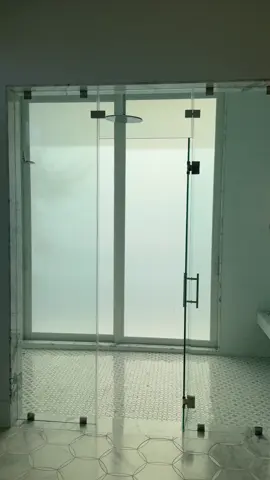 Smart glass film on a shower slinding door.  #smartglass #smartfilm #smarthome 