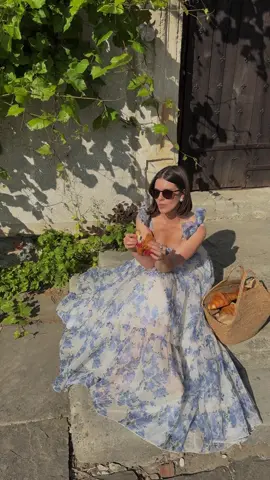 Just a girl, a croissant, and a dress made for main character mornings 🥐🌸✨ #milla #breakfastmood #maincharacterenergy #summerdress #OOTD #frenchgirlvibes #slowmorning #romanticstyle #floraldress #softaesthetic 