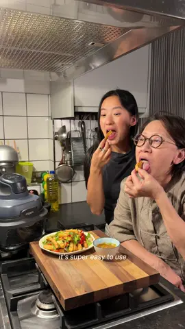 One of the most iconic (and one of my favourite) British Chinese takeaway dishes has to be salt and pepper chips. It was always a staple at mum’s takeaway and restaurant so I thought I’d show you how to recreate this life changing snack at home using the @NinjaKitchenUK CRISPi. The CRISPi is now on offer for £149 on the Ninja website! Ad Serves 2 For the veg: 1/2 red onion 1/2 white onion 1/2 red pepper 1/2 green pepper 1 spring onion 1 red chilli 2-3 garlic cloves  For the seasoning mix: 1 tbsp salt 1 tbsp paprika powder 1 tbsp MSG (optional but authentic) 2 tbsp sugar 1/2 tsp Chinese five spice, black pepper, garlic powder, ginger powder and chilli flakes  1/4 tsp Sichuan peppercorn powder and cumin powder  500g frozen chips 1 tbsp of vegetable oil spray  Chop the onions and peppers, slice the spring onion and chilli. Mince the garlic. Spray or drizzle a little oil over the vegetables and set aside.  Combine all the seasoning ingredients in a small bowl and set aside. Add frozen oven chips into the Ninja CRISPi, select the Air Fry option and cook according to the packet instructions. Flip halfway through, then add your prepped vegetables and cook until the chips are golden and the vegetables are slightly charred. Once crispy, toss everything in a large bowl with your homemade salt & pepper mix while it's hot (this is key!).  Serve immediately with a bowl of curry sauce (optional but highly recommended) and enjoy. #crispisavestheday 