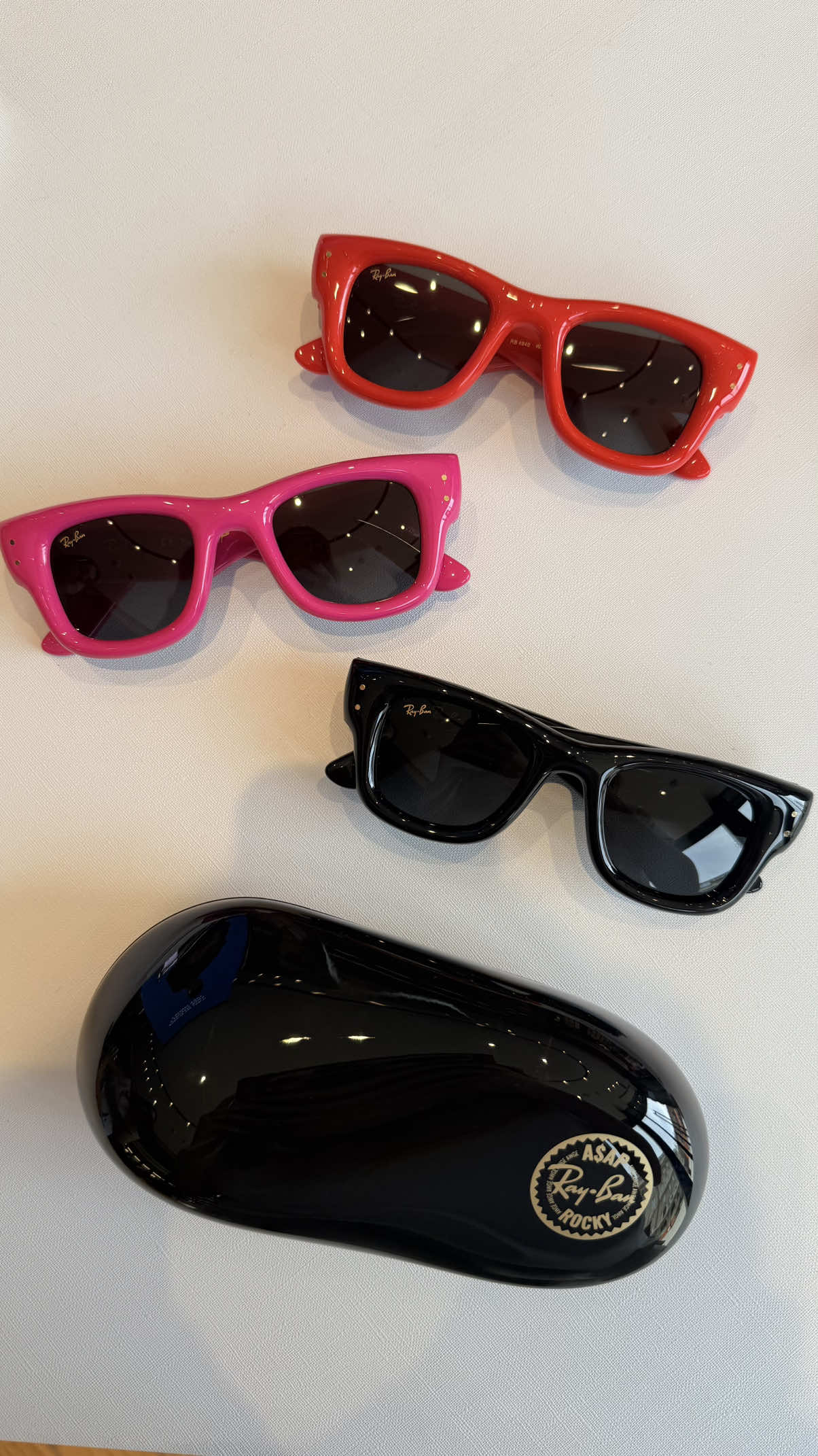 Puffer out now — black, red, yellow, pink, blue, white & orange. #RayBan #asaprocky #sunglasses 
