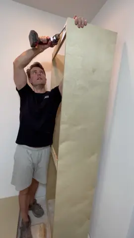 You just shimmy it up into place #carpenter #carpentry #construction #woodworking #builder #contractor #woodworker #DIY #diyproject #closet #customcloset 