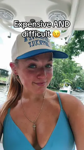 At least we own it!! Expensive and difficult hat!  Funny trucker hats - trucker hats - women’s trucker hat - expensive and difficult hat #funnytruckerhats #womenstruckerhats #truckerhats