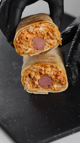 It’s Shawarma time. Detailed written Recipe on Kikifoodies.com Protein & Main Fillings 2 medium chicken breasts (about 600g) 3 hot dogs (if using) Chicken Seasoning ½ teaspoon salt ¼ teaspoon chicken bouillon cube 1 teaspoon onion powder 1/2 teaspoon Red pepper  1 teaspoon minced garlic 2 tablespoons oil 1 tablespoon lemon juice Veggies 1 cup shredded cabbage 1 medium carrot, grated or julienned ¼ cup purple cabbage (optional) Sauce ½ cup mayonnaise ¼ cup ketchup 1 teaspoon cayenne pepper 2 teaspoons sweet chili sauce (or substitute with 1 teaspoon sugar) 2 teaspoons lemon juice Bread 4 pita breads