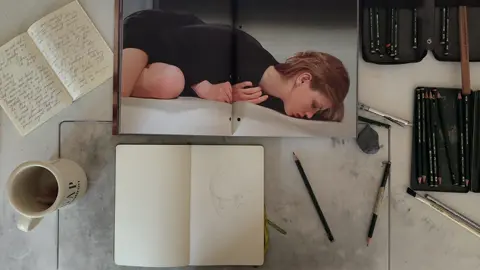 Drawing, tea, good music, Prada