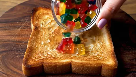 Spreading glass gummies on toast asmr #asmr #asmrsounds #asmrvideo #oddlysatisfying #ai #asmrtiktoks #glassfruit 