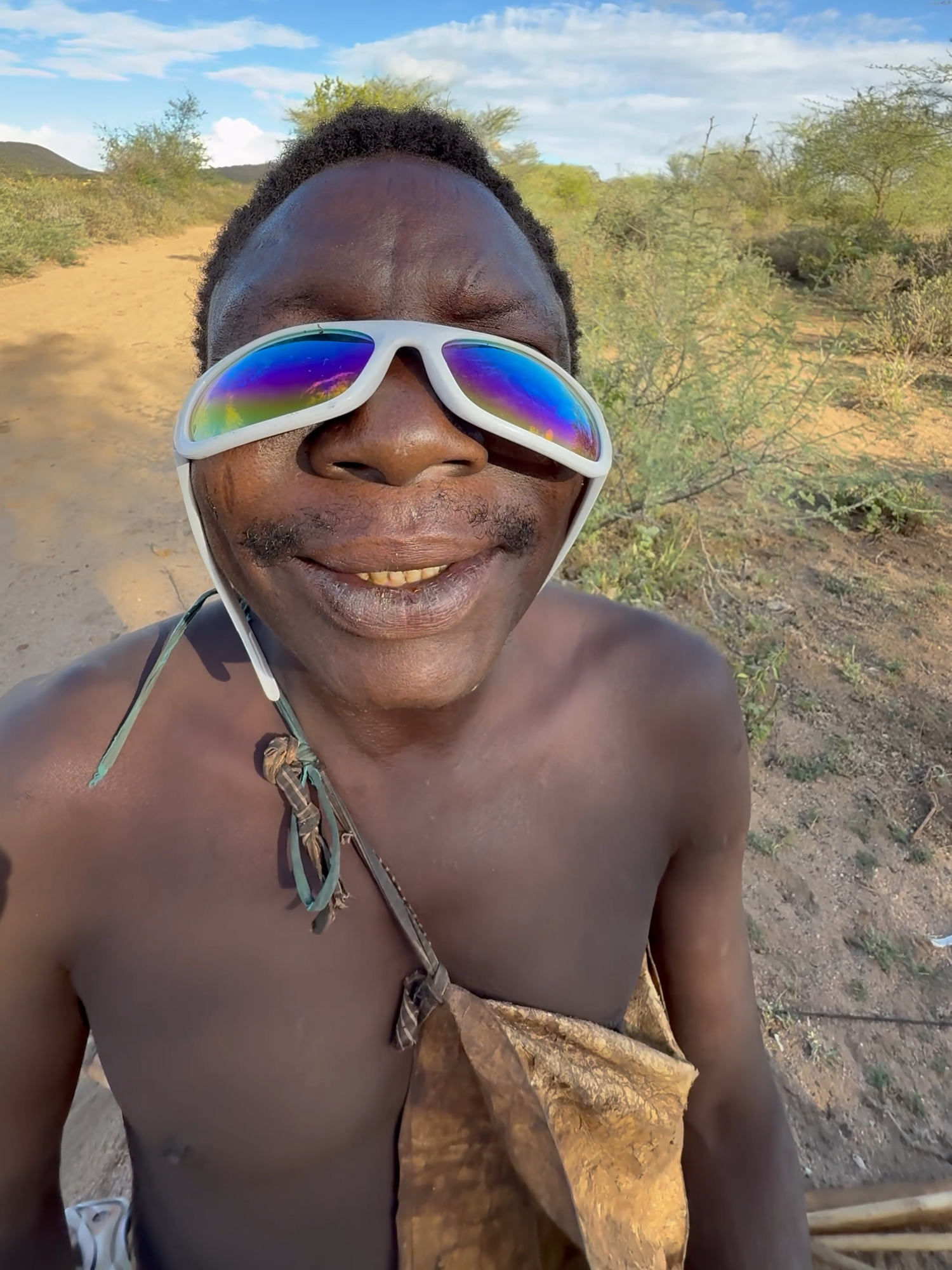 Hadzabe Tribe bushmen Chabba try modern sunglasses for the first time ever 😅😍