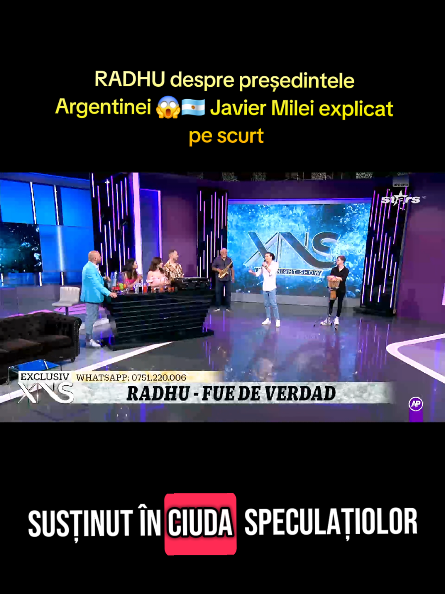 Radhu, cunoscut drept „regele cumbiei din România” și primul artist român clasat în topurile Billboard în acest gen muzical, a lansat videoclipul piesei „Fue de verdad” – un omagiu sincer adus iubirii trăite și pierdute. Melodia, cu puternice influențe latino-americane și o linie melodică plină de emoție, marchează o etapă matură în cariera artistului. Invitat recent la Antena Stars, Radhu a vorbit deschis nu doar despre proiectele sale muzicale, ci și despre Daniela, o persoană semnificativă din viața lui, precum și despre realitățile sociale și politice din Argentina. Radhu reușește să rămână un artist autentic, care îmbină pasiunea pentru muzică cu o viziune lucidă asupra lumii care îl inspiră. Videoclipul „Fue de verdad” este acum disponibil pe YouTube și toate platformele digitale. link:  https://youtu.be/eqSLILt2bDs?si=el8q3JZSvsLIL0M9 #știri #romania #news #newsromania #tiktokromania 
