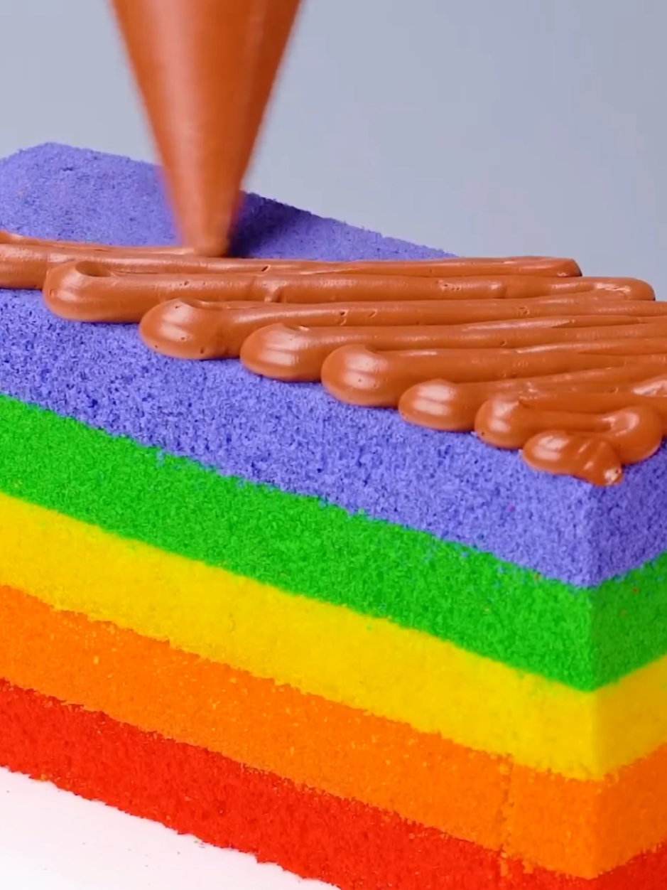 An ice-cream cake is a delightful frozen dessert that combines the rich, creamy texture of ice cream with the soft, moist layers of cake or cookie crumbs. Typically layered and molded in a cake pan, this dessert can feature various flavors such as vanilla, chocolate, strawberry, cookies and cream, or even more exotic combinations like mint-chocolate chip or caramel swirl. The layers may be interspersed with fudge, fruit, or crunchy cookie crumbles for added texture and flavor. It’s often topped with whipped cream, frosting, sprinkles, or chocolate ganache, and is served chilled, making it a perfect treat for birthdays, summer parties, and other special occasions. #100kviews #awesome #foryou #fyppppppppppppppppppppppp #viralvideo #trending #Baking #cream #Foodie #all #ice #icecream 