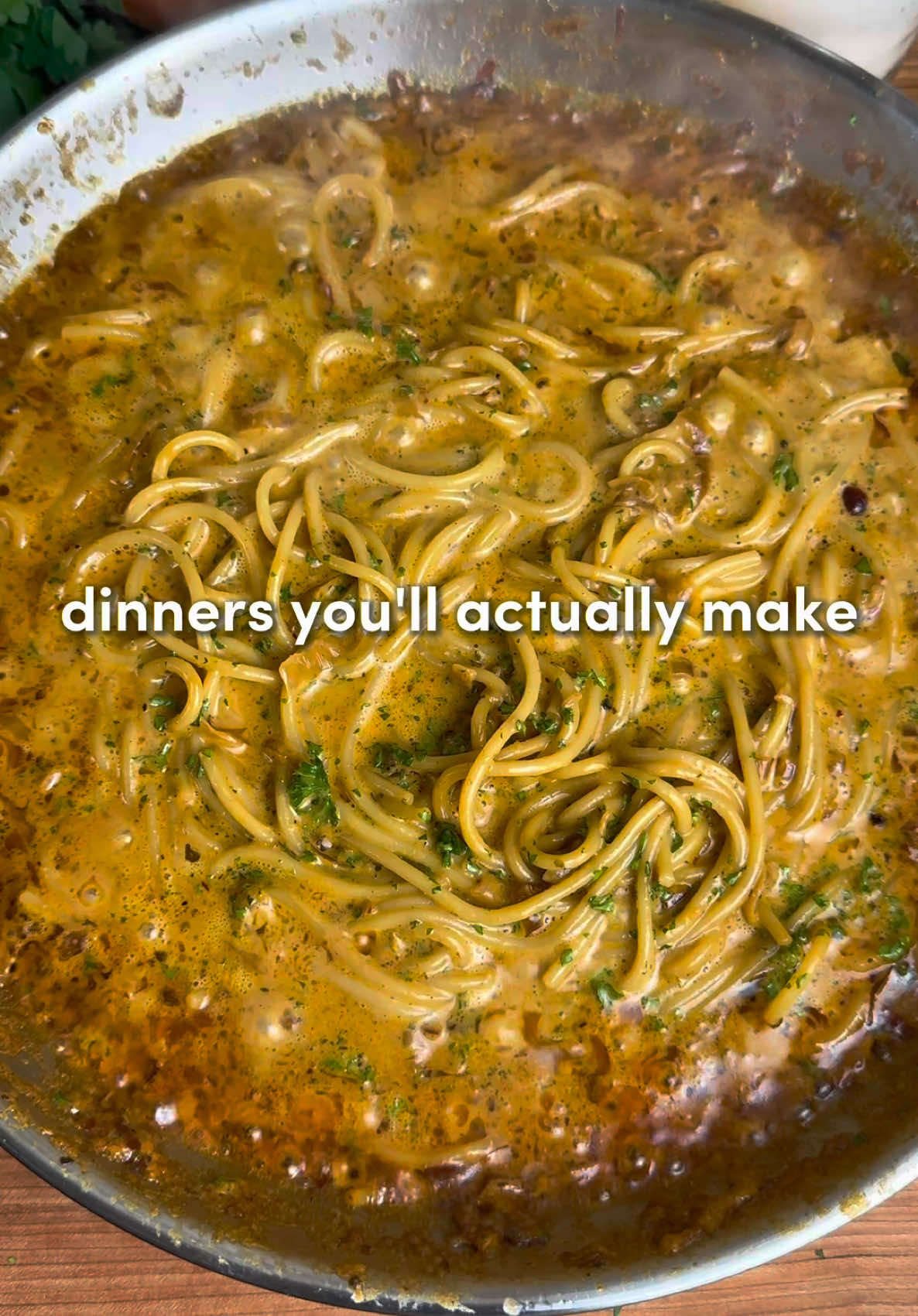 Caramelized Onion and Garlic Spaghetti 🔥 Minimal effort, max comfort. Sweet, savory, a little spicy... this one hits every note. Tip: Best served with with chicken, shrimp, or tofu 🫡 Ingredients: -1 large onion, thinly sliced -4 garlic cloves, minced -2 tbsp chili crisp -1 cup of cream or coconut milk, room temperature -1 tbsp soy sauce, optional -1/2 cup fresh Parmesan cheese, grated -8 oz (225g) pasta of your choice -2 tbsp butter -1 tbsp olive oil -Seasonings (1 tsp each): paprika, garlic powder, salt, pepper, italian seasoning 1. Slice your onion like it owes you money, mince that garlic (use fresh please), and measure out all your seasoning. Bring a cup of cream or coconut milk to room temperature. 2. Heat 2 tbsp butter + 1 tbsp olive oil in a large skillet over medium. Add in the onions and let them vibe for 15–20 minutes, stirring occasionally, until golden and jammy. If they start sticking, hit ‘em with a splash of water. 3. While your onions are caramelizing like sweet little angels, boil a pot of salted water and cook the pasta until al dente. Drain, but don’t forget to save some of that pasta water — it’s liquid gold. 4. When the onions are deeply golden, stir in your minced garlic and all the seasonings. Let it all bloom for a minute, then add the chili crisp and saute for a minute. Pour in your cream (or coconut milk). Let it simmer and get cozy for a few minutes then add the grated Parmesan cheese. 5. Add your pasta to the sauce and toss to coat. Use that reserved pasta water to loosen things up if it’s too thick — you’re going for silky, not sticky. 6. Serve hot with an extra spoon of chili crisp on top for a spicy kick and maybe a sprinkle of fresh parsley if you’re feelin’ fancy. #Recipe #dinnerideastiktok #dinner 