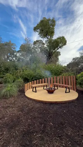 Built this to finally have a spot to unwind outside after a long day. I gave this space some extra flare with a curved timber feature wall to match the natural surroundings and light up the garden at night. This project was made possible with @Bunnings and the many trips I made there to get it done. #DIY #firepit #bunningsinspo 