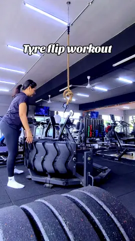 A tire flip workout is a full-body exercise that builds strength, power, and cardiovascular fitness. It involves flipping a large tire repeatedly, engaging multiple muscle groups and improving overall athletic performance.  How to perform a tire flip: 1. Stance: Stand facing the tire with feet shoulder-width apart, knees slightly bent, and back straight. 2. Grip: Bend at the knees and hips, getting a good grip on the tire's edge. 3. Lift: Drive through your legs and push with your arms to lift the tire off the ground, using your legs to initiate the movement. 4. Flip: Continue pushing the tire upwards, using your legs and core to bring it over. 5. Repeat: As the tire falls, move to the other side, reset your grip, and repeat the process.  @jaykay6771  #freetimeathletes #gym #workout #training #program #strengthandconditioning #coach #Fitness #personaltrainer #justdoit #mindset #gymmotivation 