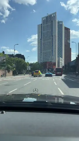 Powerful blue Lamborghini ride next to a police car in central London