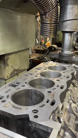 Block resurfacing is a machining process used to restore the flatness of an engine block’s deck surface—the area where the cylinder head sits. Over time or due to overheating, the deck can become warped or damaged. Skimming removes a thin layer of material to create a perfectly flat, smooth surface, ensuring a proper head gasket seal and optimal compression. It’s commonly performed during engine rebuilds or after a blown head gasket to prevent leaks and maintain engine performance.                            The BMW S63B44 is a high-performance 4.4-liter twin-turbocharged V8 engine developed by BMW M GmbH. It is the M-division’s version of the N63, BMW’s first production turbocharged V8. The S63 was introduced in 2009 and has powered several high-performance M models since. The S63 is based on the N63 engine architecture but significantly upgraded for M applications. It features twin-scroll turbochargers placed in a “hot-vee” configuration (inside the cylinder banks), which reduces turbo lag and improves throttle response. It uses direct fuel injection, Double-VANOS (variable camshaft timing), and Valvetronic (variable valve lift). #fyp #for #foru #vira #viralditiktok #bloc #engine #engineblock #satisfyingvideo #cylinderblockrecondition #cylinderblockrepair #top #engineering #bmwmotorsport #satisfy #mechanic #skim #skims #skimming #skimmingstone #result #resurface #resurfacing #bmwlife #bmwclub #bmwmotorrad #londoncars #sportcar #rangeroversport #topgearuk #ferrari #landrover 