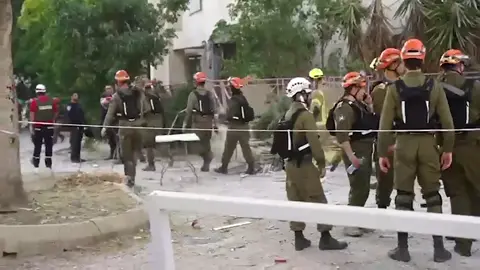 First responders and search-and-rescue teams operating at an impact site in southern Israel, where a missile fired by the Iranian regime murdered four people and injured several others. We salute these brave heroes, who have been working around the clock. Credit: IDF