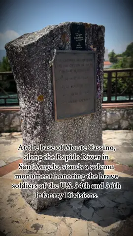 At the base of Monte Cassino, along the Rapido River in Sant’Angelo, stands a solemn monument honoring the brave soldiers of the U.S. 34th and 36th Infantry Divisions. #MonteCassino #RapidoRiver #SantAngelo #WWIIItaly #34thInfantryDivision #36thInfantryDivision #ItalianCampaign #USArmy #WWIIHistory #WalkAmongHeroes #HonorTheFallen #MilitaryMemorials #WW2Europe #NeverForget #CombatValor #DdayToVictory