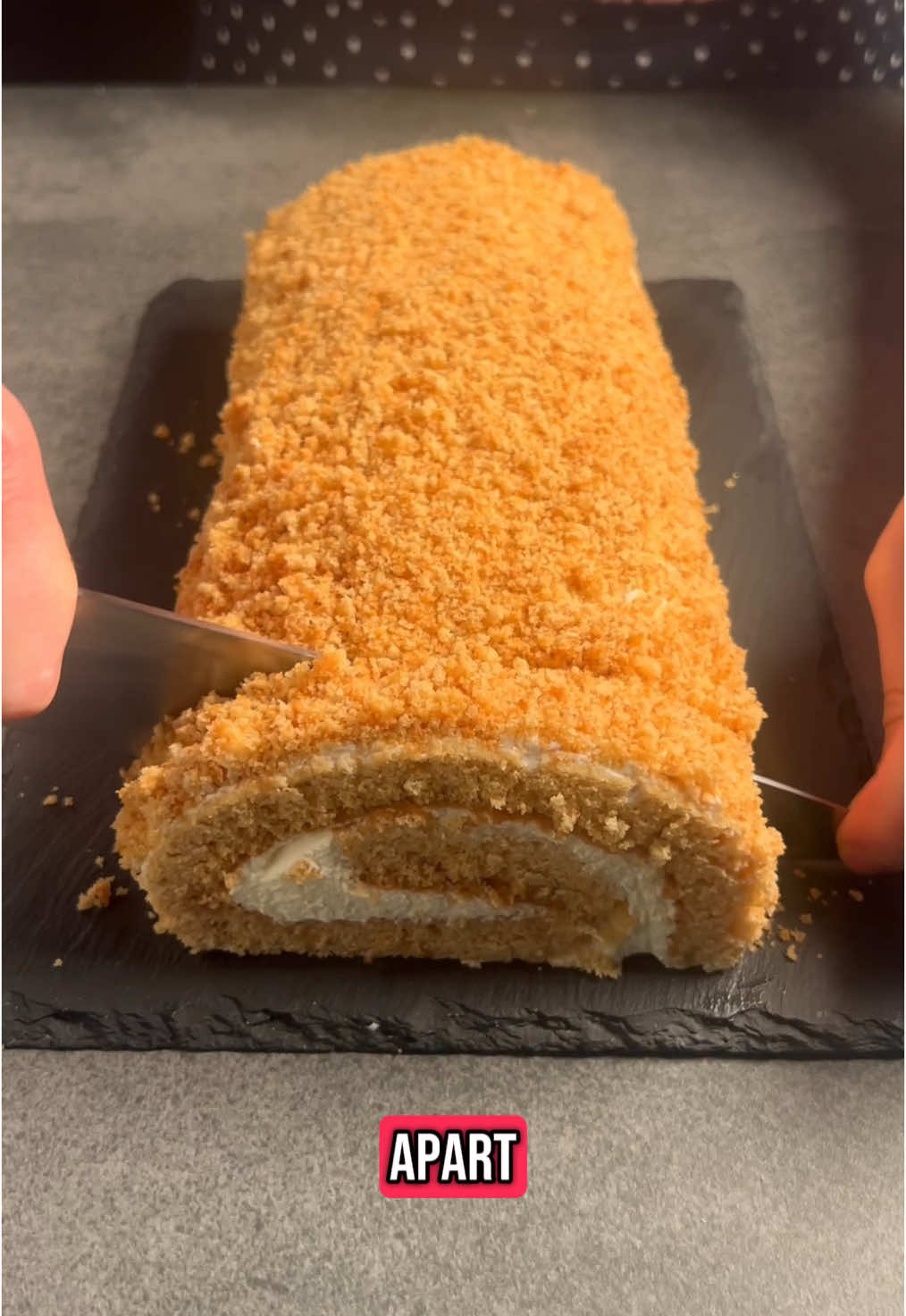 I guess I still prefer honey cake, but this was good too. ☺️        Honey Roll 🍯 Ingredients: For the sponge: 	•	160g honey 	•	60g butter 	•	3 eggs 	•	70g sugar 	•	A pinch of salt 	•	1 tsp baking soda (level, not heaped) 	•	200g all-purpose flour For the cream: 	•	250g sour cream 	•	60g powdered sugar 	•	200g heavy cream (cold) ⸻ Instructions: 1. Prepare the honey mixture: In a small saucepan, melt the honey and butter together over medium heat. Add baking soda and stir — the mixture will foam and lighten in color. Remove from heat and let it cool slightly. 2. Whip the eggs: In a large bowl, beat the eggs, sugar, and salt until light and fluffy (3–5 minutes). 3. Combine wet ingredients: Slowly pour the warm (not hot) honey mixture into the eggs while mixing on low speed. 4. Add the flour: Sift in the flour and gently fold until smooth and well combined. 5. Bake: Line a baking tray (approx. 30×40 cm) with parchment paper. Spread the batter evenly and bake in a preheated oven at 180°C (top/bottom heat) for 8–10 minutes, or until golden and springy to the touch. 6. Roll the sponge: While still warm, flip the sponge onto a clean towel or parchment paper, peel off the bottom paper, and gently roll it up from the short side. Let it cool rolled, so it keeps the shape. ⸻ Prepare the cream: 7. Whip the cream: In a chilled bowl, whip the heavy cream with powdered sugar until medium peaks form. Add sour cream. Carefully mix everything together. ⸻ Assemble the roll: 8. Fill and roll: Once the sponge is cool, carefully unroll it. Spread the cream evenly, leaving a small gap at the edges. Gently roll it back up. 9. Chill and finish: Wrap the roll in plastic wrap and refrigerate for at least 4 hours, or overnight. Optional: Decorate with leftover cream or sprinkle with sponge crumbs. #reels #tiktok #recommendations #Recipe #cake #delicious #food #Foodie #Summer 