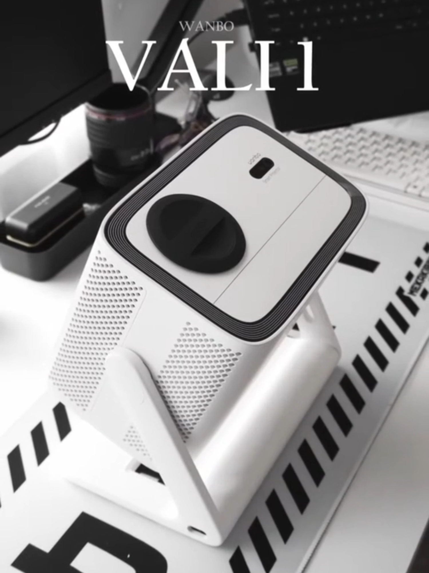 Meet the Wanbo Vali 1 – Designed to Move You. From its 200° gimbal stand to whisper-quiet performance, the Vali 1 brings stunning visuals, powerful sound, and Android TV 11 into one sleek package. Whether it’s movie night, game day, or ambient chill—this projector is built to elevate every moment. 🌟200° Gimbal Stand: Find your perfect viewing angle with ease. Separate Power Interface: Designed for convenience and ease of use. 🌟ASA3.0 Image Adjustment: Powered by advanced algorithms for effortless, picture-perfect visuals. 🌟900 ANSI Lumens: Experience stunning brightness that lights up any room. 🌟Android TV 11: Unlock endless entertainment at your fingertips. 🌟12W Full Range Speaker & 500cc Sound Chamber: Feel every beat with immersive, high-quality sound. 🌟Ambient Wall Mode: Seamlessly blend technology with your home decor. 🌟Lens Protection Cap – Keep your lens safe and stylish. 🌟Largest Cooling Fan Noise as Low as 28dB/m: Experience ultra-quiet performance without compromise. 🌟Game Mode: Enjoy smooth, lag-free gaming for the ultimate play session. #MovieNight #WanboProjector #withWanbo #WanboVali1 #GimbalProjector #Vali #wanboph #wanbo #Tech #projector #hometheater #homecinema #Netflix