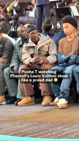 Pusha T watching & filming Pharrell’s @Louis Vuitton show from the front row like a proud dad 🥲