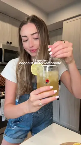3 ingredient coconut water lemonade 🍋🌴🥥 recipe below! INGREDIENTS: - 1/2 cup lemon juice (~3 lemons) - 4 cups coconut water  - 1/4 cup maple syrup or agave INSTRUCTIONS:  - start by juicing your lemons into a measuring cup. Once you reach 1/2 cup, pour into a large glass bottle.  - Pour your coconut water over the lemon juice. Add your sweetener of choice and give it a quick mix. - Pop in the fridge and enjoy within 4-5 days! 🤭 #lemonade #hydration #summerhydration #summerrecipes #healthylifestyle #homemadelemonade #healthyrecipes #EasyRecipes #easylemonade #coconutwater 