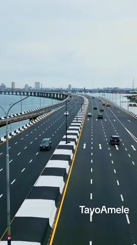 The Third Mainland Bridge isn’t just a road , It’s a lifeline carved into the heart of Lagos. Stretching 11.8 kilometers across the lagoon, it connects Mainland to Island, chaos to calm, and sometimes, reality to the unexplained. 🌉 Construction began in 1980 and was completed in 1990. Since then, it’s carried the weight of a city that never sleeps, millions moving across its span every single day. But as the city winds down and night falls, the bridge takes on a different energy. Some say the waters below hold stories. That strange things are seen when traffic fades and silence creeps in. Whispers. Shadows. Unfinished tales. In Lagos, everything has a story but this bridge has legends. Video Credit: @tayoamele  #lagos360 #lagos #ThirdMainlandBridge #LagosNights #UrbanMyth #CityOfStories #LagosLife #BridgeOfLegends