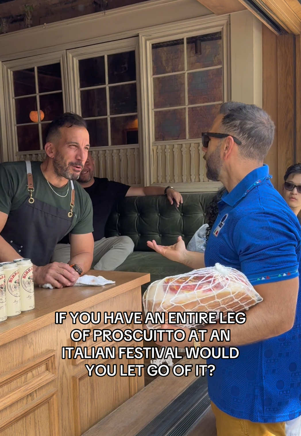 Emotional support prosciutto. Protect it at all costs. 🍖💪🏼 PRO TIP: weave your fingers through the netting for vice-like grip.  #italian #food #italianfood #deli #meat #prosciutto #festival #funny #humor #fyp 