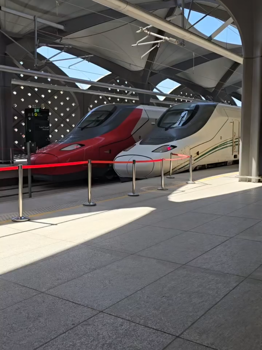 *Key Features:* - *Speed:* The train operates at a top speed of 300 km/h, covering the 450-kilometer distance in approximately 2 hours and 30 minutes. - *Frequency:* Trains run multiple times daily, with increased frequency during peak travel seasons like Ramadan and Hajj. - *Stations:* The train stops at several key stations, including Mecca, Jeddah, King Abdulaziz International Airport, King Abdullah Economic City, and Medina. *Ticket Information:* - *Prices:* Economy class tickets typically cost around 175 SAR (£39), while business class tickets cost around 285 SAR (£60). Children under 12 years old receive a 50% discount. - *Booking:* Tickets can be booked online through the official Haramain Railway website or mobile app, or at train stations. - *Classes:* The train offers two classes: Economy and Business, with varying levels of comfort and amenities. *Travel Tips:* - *Book Early:* Reserve your tickets in advance to secure the best prices and preferred travel times. - *Arrive Early:* Reach the station at least 30 minutes before departure to complete security checks and boarding procedures. - *Comfort Essentials:* Bring essentials like water and snacks, although onboard services are available. *Amenities:* - *Free Wi-Fi:* Stay connected during your journey with complimentary Wi-Fi. - *Dining:* Onboard café with snacks and drinks available for purchase. - *Accessibility:* Facilities for disabled passengers, including priority seating and additional support at stations