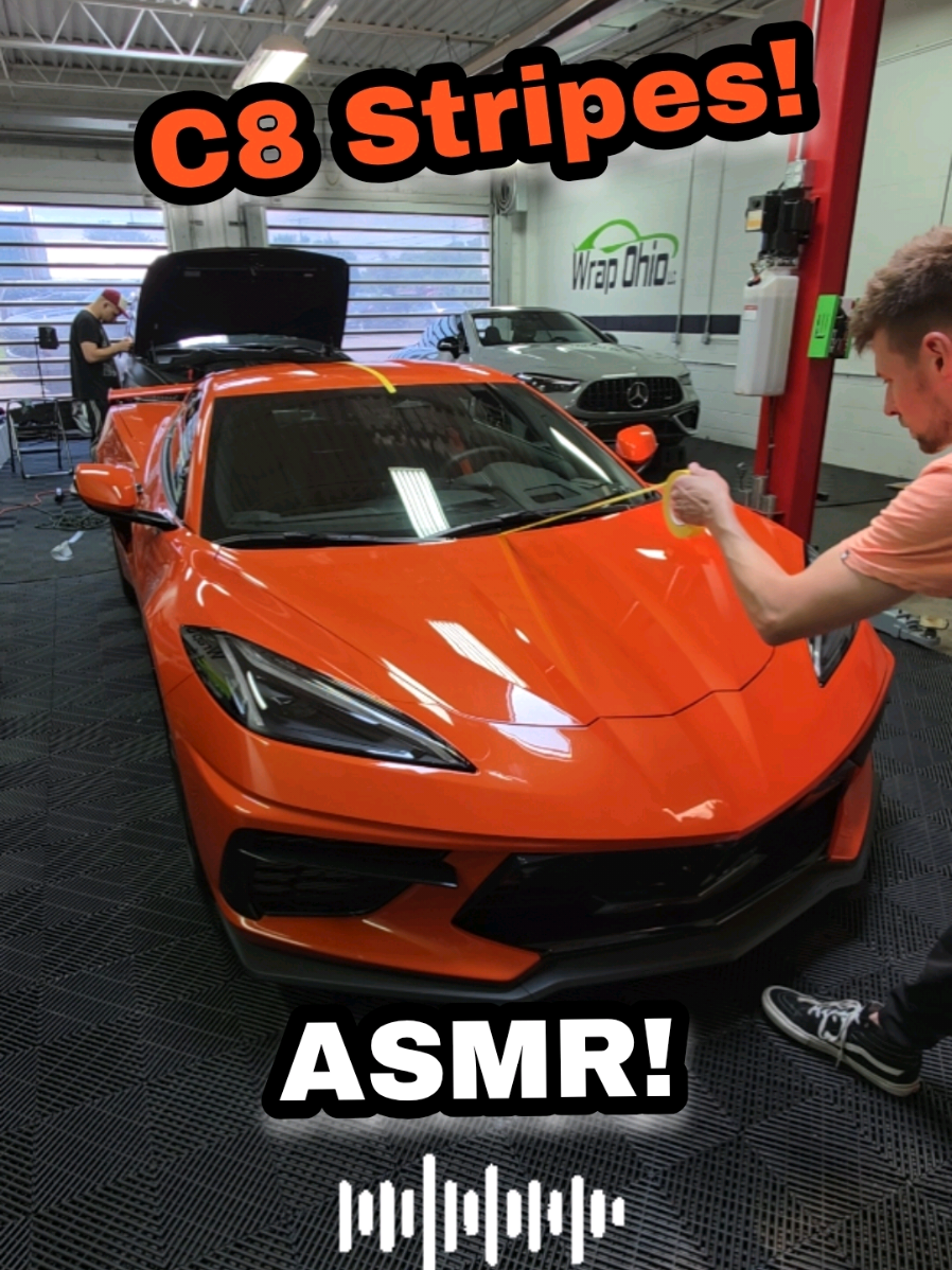 Laying down factory inspired racing stripes for this C8 Corvette using Gloss black metallic vinyl wrap to match the factory carbon flash accents.  We also wrapped the trim piece on the rocker panels. This addition of the stripes and rocker accents helps break up all the orange and give this C8 Corvette a more aggressive look.  We are using knifeless tape in order to cut the stripes! What do you think of the final results? #asmr #asmrsounds #wrap #vinylwrap #carwrap #RacingStripes #corvette #c8corvette 