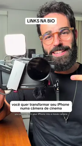 LINK NA BIO Transforme seu iPhone em uma Câmera de Cinema com Este Kit! 🎥📱 Para melhorar a qualidade das suas gravações com o iPhone:  	1.	Cage Universal Ulanzi Lino: Oferece suporte robusto e múltiplos pontos de montagem para acessórios.  	2.	Hub 4x USB-C: Expande as conexões do seu dispositivo, permitindo o uso simultâneo de múltiplos periféricos. 	3.	Iluminador LED: Garante iluminação uniforme e profissional para suas filmagens. 	4.	Clip para Filtros: Facilita a adição de filtros à lente do iPhone, aprimorando a qualidade da imagem. 	5.	Filtro ND: Controla a exposição em ambientes muito iluminados, essencial para vídeos de alta qualidade. 	6.	Microfone Rode Wireless GO II: Proporciona áudio claro e sem fio, ideal para gravações profissionais.  	7.	Pendrive 1TB USB-C: Oferece armazenamento externo amplo e rápido para seus arquivos de vídeo. Com esses acessórios, seu iPhone estará pronto para capturar vídeos com qualidade cinematográfica! 🎬 Transform Your iPhone into a Cinema Camera with This Kit! 🎥📱 	1.	Ulanzi Lino Universal Cage: Provides sturdy support and multiple mounting points for accessories.  	2.	4x USB-C Hub: Expands your device’s connections, allowing simultaneous use of multiple peripherals. 	3.	LED Light: Ensures uniform and professional lighting for your shoots. 	4.	Filter Clip: Facilitates the addition of filters to your iPhone’s lens, enhancing image quality. 	5.	ND Filter: Controls exposure in brightly lit environments, essential for high-quality videos. 	6.	Rode Wireless GO II Microphone: Delivers clear, wireless audio, ideal for professional recordings.  	7.	1TB USB-C Flash Drive: Provides ample and fast external storage for your video files. With these accessories, your iPhone will be ready to capture cinema-quality videos! 🎬 #DicasDeiPhone #dicadetecnologia  #filmmaker #storymaker #Tecnologia #iphonetricks