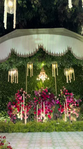 Tradition, but make it colorful! A petal party filled with lush greeneries and bursting vibrant florals, creating a quirky take on love, legacy, and celebration. Look how lively motifs and fragrant elements intertwine together, crowned by a striking tuberose garland chandelier 💚♥️ For Dhila & Ariq’s Siraman & Midodareni 🧡💗 Terima kasih Pak @pramonoanung atas kepercayaannya 🙏🏻❣️ Decor & Concept: @stupacaspea @__untitled01 @ekadw25 @adiita.w @bimo_singgih @sabandaragnes @rhantie10 Lenny WO: @tiarajosodirdjo_assc  Lighting: @etceteralighting  Pemandu Adat Jawa: @mamiehardo @mitahardo @mirahardo  Bride’s MUA: @mirahardo  Wedding Photography: @venemapictures  #siraman #midodareni #dekorsiraman #dekormidodareni #siramanjawa #adarjawa  #akad #akadnikah #resepsi #reception #dekorresepsi #receptiondecor #scenery #wedding #indoordecor #weddingdecor #weddingdecoration #stupacaspea #flower #floralarrangement #flowers #decor #decoration #siraman #siramandecor #pramonoanung 