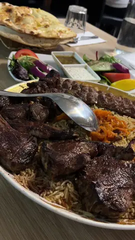 Afghan Kebab is a must-try spot in Carlton offering bold flavours, generous portions, and incredible value. Authentic food served in a warm, casual setting with great energy throughout. 🔥 • 🥘 Deal for Two: Unbelievable value for rice, grilled meats, salad, and sauces, enough to feed three. Generous, balanced, and perfect for sharing. • 🍚 Rice: Fragrant and deeply flavourful, with spices and sweet raisins adding texture and a subtle contrast. Easily one of the highlights. • 🥩 Grilled Meats: Juicy, well-marinated cuts with a perfectly charred exterior. Herbaceous and aromatic, cooked to perfection. • 🍞 Afghan Bread: Soft, warm, and great value. Ideal for scooping up sauces and pairing with the mains. • 🍮 Gulab Jamun: Sweet, soft, and syrupy with a unique texture, pretty solid. • 🥭 Mango Lassi: Thick, creamy, and refreshing. Sweet mango flavour comes through beautifully. Delicious food, authentic flavours, and unbeatable prices, definitely worth the visit. 📍 230 Lygon St, Carlton VIC 3053 (❌ Sponsored, ❌ Invite) #melbourne #afghanfood #kebabhouse #halal
