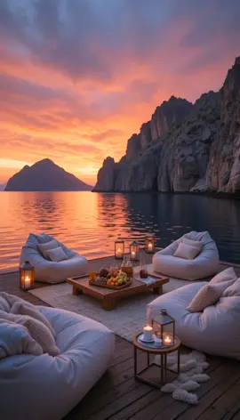 ✨ A unique holiday on a floating platform in the middle of a calm sea at the foot of majestic cliffs. 🌅 Cozy chairs, tropical fruits, exquisite chocolate truffles and a bottle of refreshing water create the perfect atmosphere. The sunset lights reflect on the water, turning this moment into magic! 🌊
 #FloatingLuxury #SunsetVibes #OceanSerenity #CliffsideEscape #AestheticMoments #CoastalLuxury #RelaxInStyle #GoldenHourGlow #DreamyGetaway #tiktoktravel 