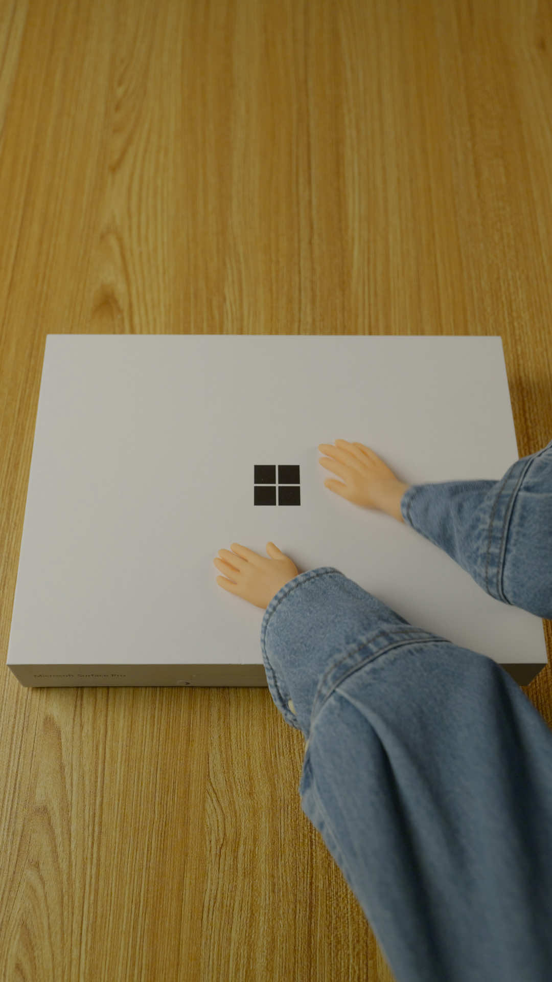 Even tiny hands love unboxing the Platinum 13-inch Surface Pro. #Microsoft #Unboxing #SurfacePro #TinyHands #CopilotPCs 