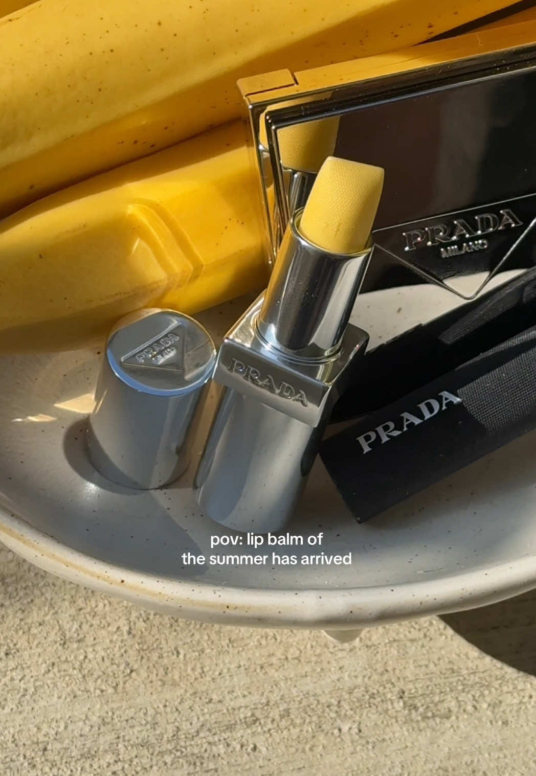 soon to be your new bag essential, the banana balm from @pradabeauty adds a warm shimmer glow that’s perfect for summer #pradabeauty #giftedbypradabeauty #pradabalm #pradabeautybananabalm #sephora #newmakeup #lipbalm #lipstick #viralmakeup  @sephora 