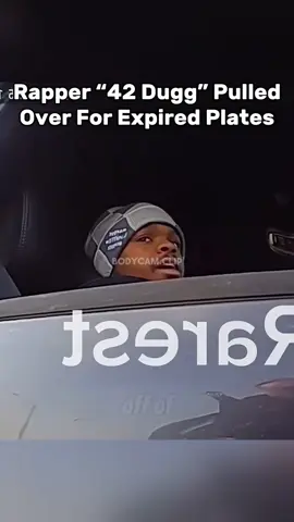 Rapper 42 Dugg was stopped by police for going 40mph in a 25mph zone. The officer also noticed that his truck had expired tags on it. Listen closely as the officer goes back into his patrol car, do you think he knew who he pulled over? #bodycamera #fypツ #policevideos #42dugg 