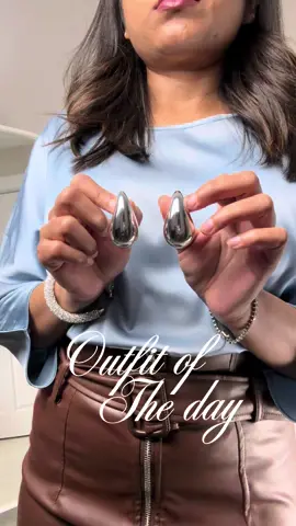 A brown leather skirt paired with a light blue satin blouse, accented by sleek silver accessories. Paired with blue heels and a matching bag, this look strikes the perfect balance between edgy and elegant. 🦋✨ . . #OutfitInspo #FashionReels #StyleGoals #ChicOutfit #TrendyLooks #Fashionista #InstaFashion #LeatherSkirt #WhiteAndBrown #OutfitOfTheDay #FashionTrends #StyleInspo #OOTD #StreetStyle #FashionAddict #colourcombination #FashionLovers #FashionInspiration #LookBook #FashionDiaries #litupwithdolly #fashion #bendablenecklace #fashionblogger #outfitoftheday #trendingreels #bluebrown #blueandbrown #CapCut 