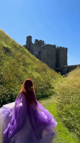 Did you know that there are 1,500 castles currently standing in the United Kingdom? 🏰🇬🇧 This is the moat walk at Arundel Castle. Slightly hidden but you’re allowed to walk through… or perhaps run like you’re trying to save your kingdom in your best ballgown! ⚔️🏰👑 📍Arundel Castle, England 🇬🇧 💜 Dress by the spectacular @Chotronette!! This is my first time wearing their dresses and I am speechless!! SO PRETTY! ✨ Castles in England, English Castles, best castles in england, castles to visit in England, England castles, best English castles, best castles to visit in the UK, castles to visit from London @visitengland England, cool places to visit in England, where to go in England, best England day trips, visit Arundel #medievalaesthetic #medieval #princesscore #princessdress #fantasy #fantasygown #arundelcastle #castlesinengland #englishcastles #englandcastles #ballgowns 