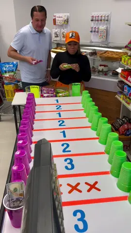 Skittles bag toss race for cash in Mini Mart