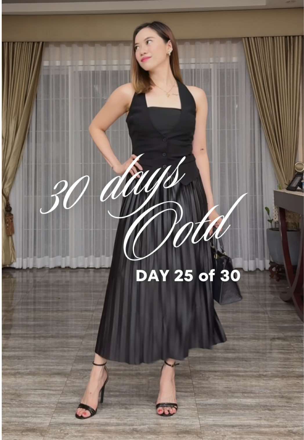 Day 25/30: All black ootd. Keeping it timeless in a black vest and pleated long skirt. #30DayOOTD #AllBlackLook #ChicAndClassic #MinimalistStyle #ElegantVibes #OOTD #StyleChallenge