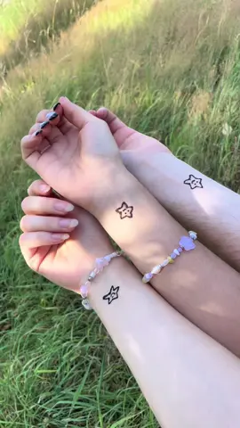 Giving each other henna tattoos💗