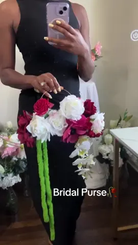 Not your average bouquet 💅✨ #bridalpurse #chicagoflorist #2025bride #2026bride #brides #weddingflorist #weddingflorals #chicagowedding #weddingplanning #engaged #bride #bridetobe 