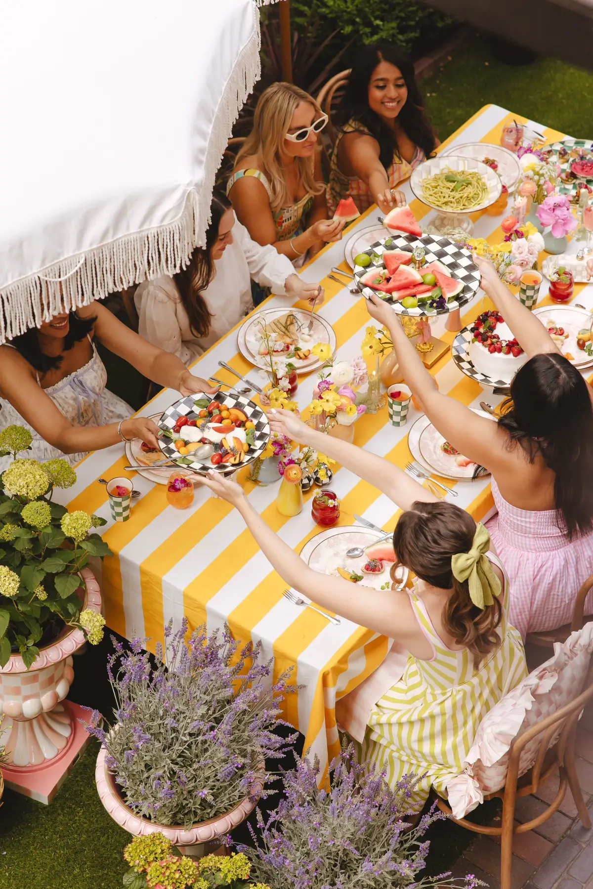 Summer dinner party of my dreams feat. @MacKenzie-Childs  Creative Direction: @The Studio Chicago  Photo: @hannahschweissphotography Video: @brandonbott Styling/Decor: @chicfromchicago    Food Styling: @matildababeandcompany via @labartists Wardrobe: @aliceandwonder 